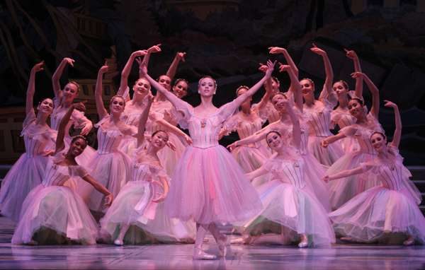 Adult ballerinas in pink performing "Waltz of the Flowers"