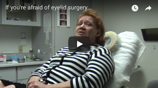 Patient on operating table explaining her happiness with choosing eyelid surgery